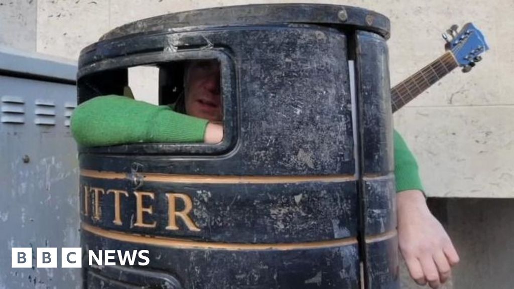 Meet the man who busks from inside a litter bin