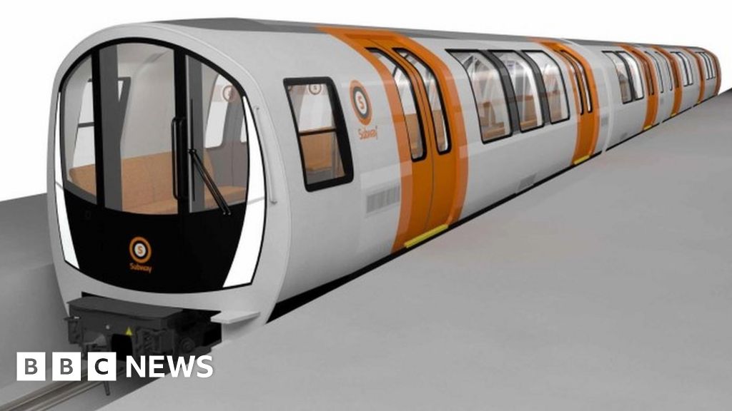 New trains unveiled for Glasgow Subway system - BBC News