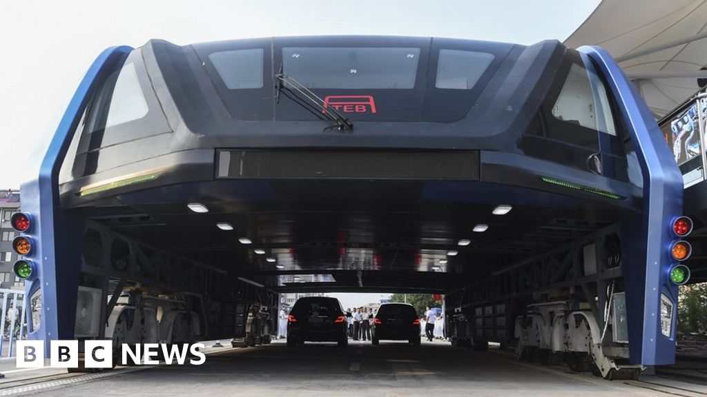 China's elevated bus: Futuristic 'straddling bus' hits the road