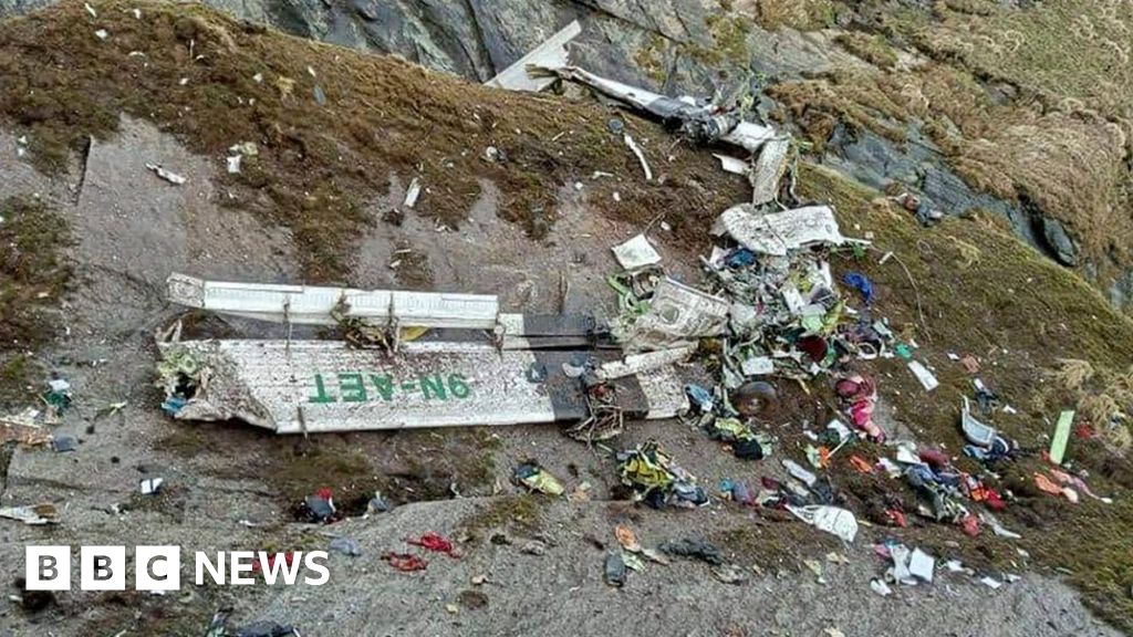 Nepal plane crash: Officials recover black box from wreckage - BBC News