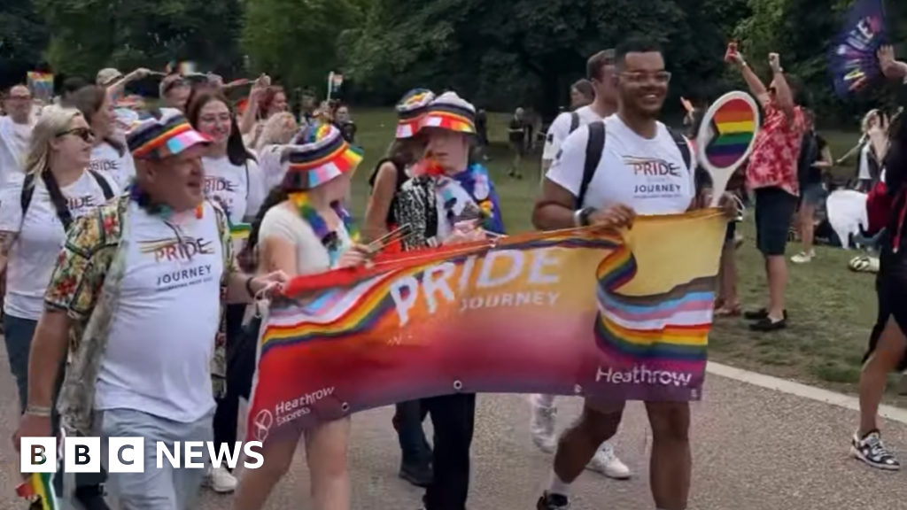 Windsor Castle's Long Walk hosts first pride march - BBC News