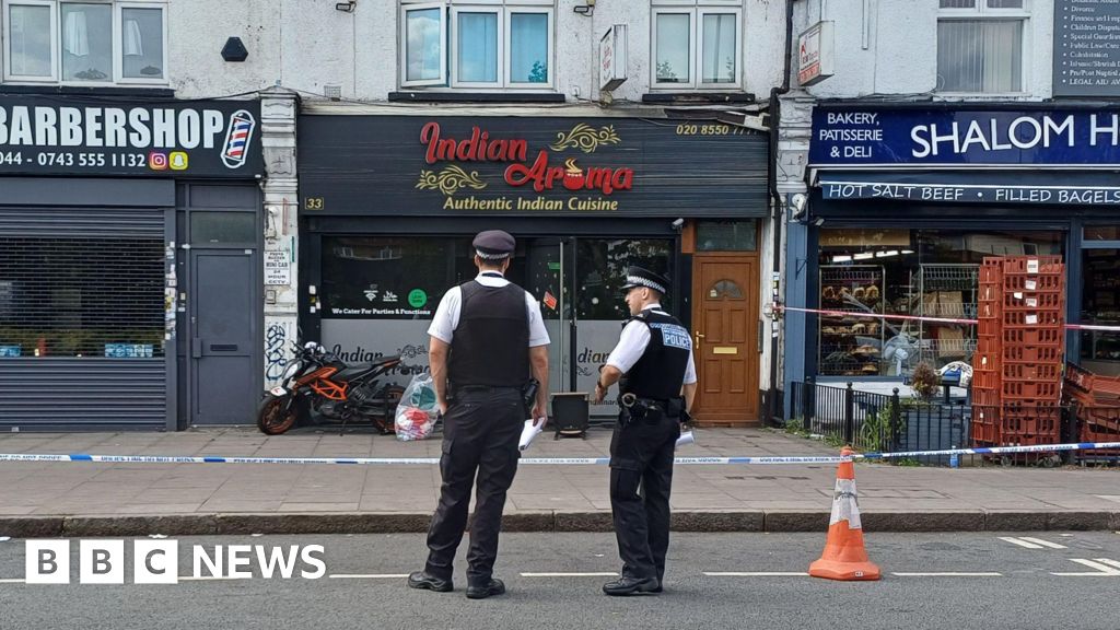 Two arrested over restaurant 'arson attack'