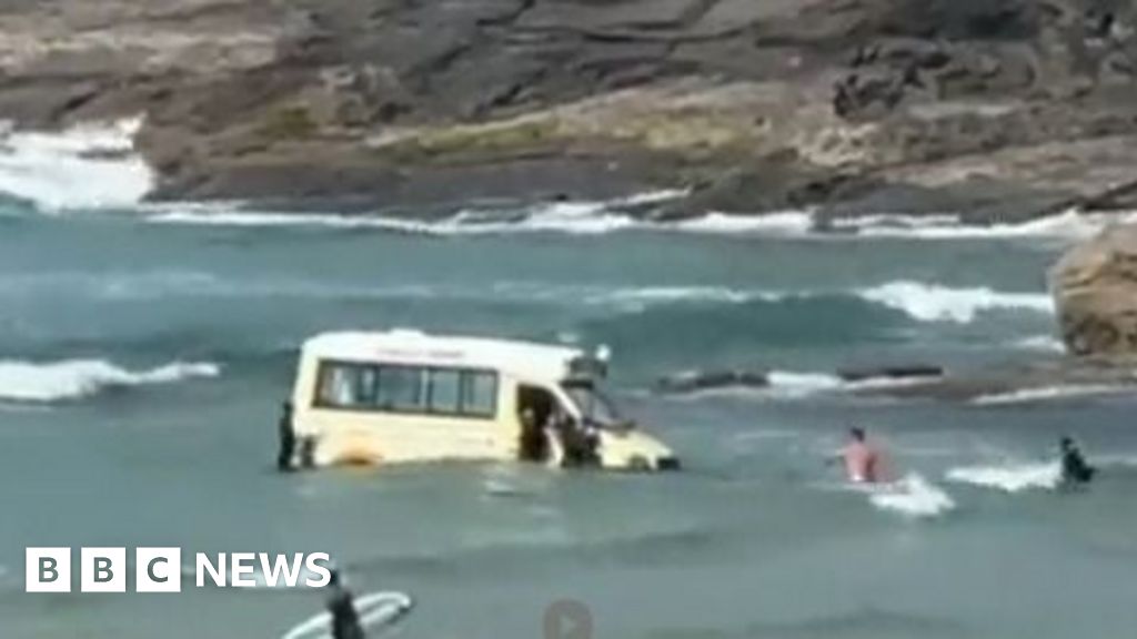 Ice cream van swept out to sea in rising tide