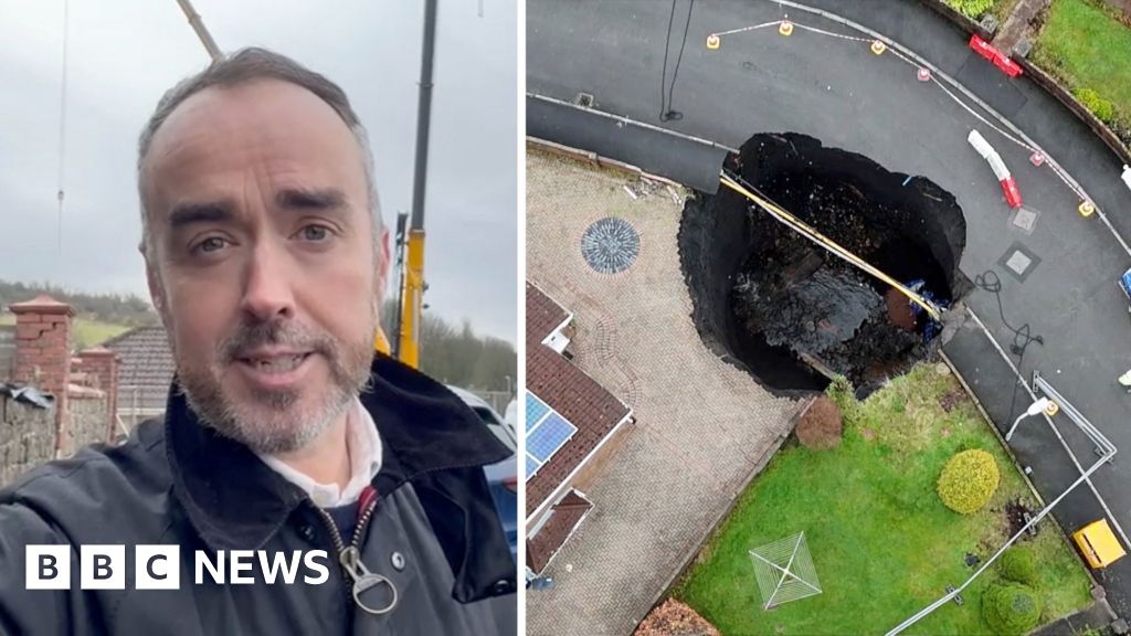 Cranes work to stabilise growing sinkhole as Storm Darragh rolls in