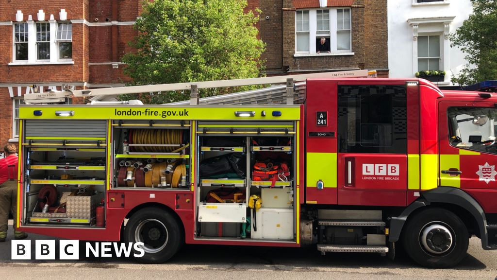 Teenager dies in flat blaze next to fire station