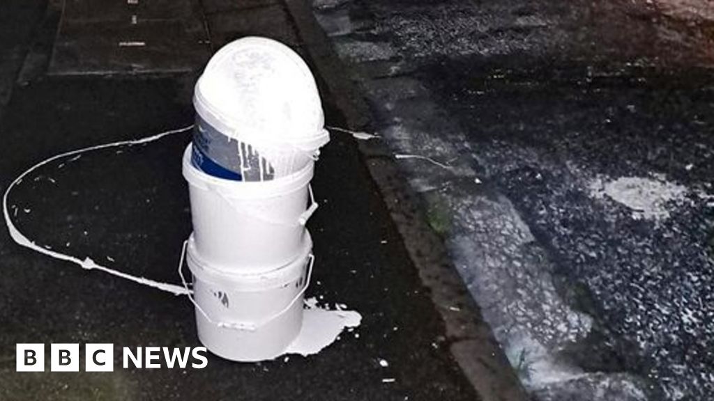 'Huge spillage' of paint turns Fazakerley road white BBC News