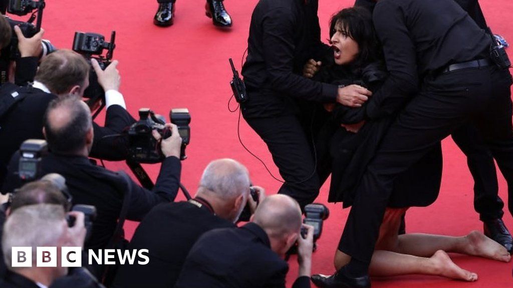 Topless woman protests against Ukraine sexual violence