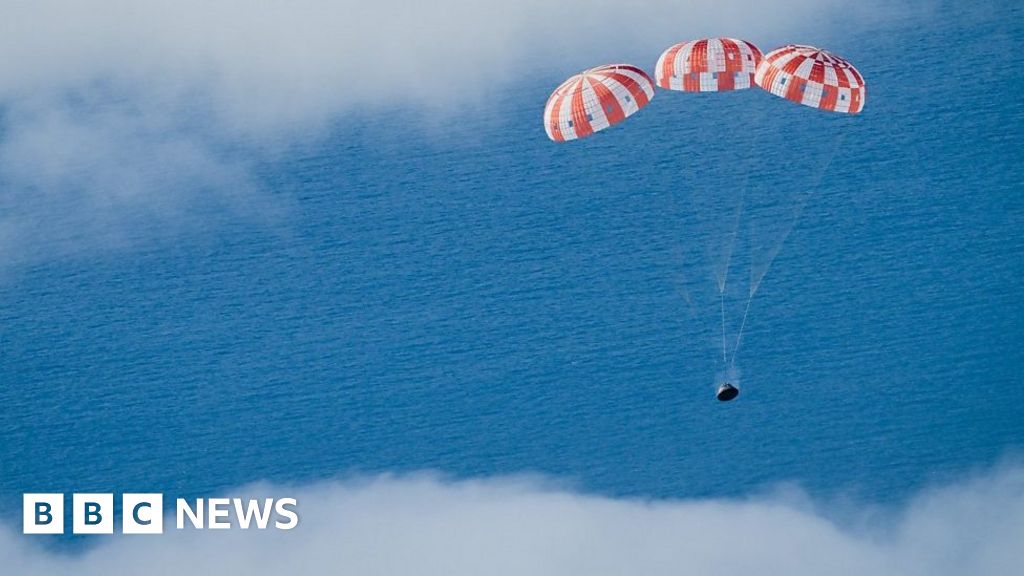 Moment Orion capsule returns to Earth after Moon mission