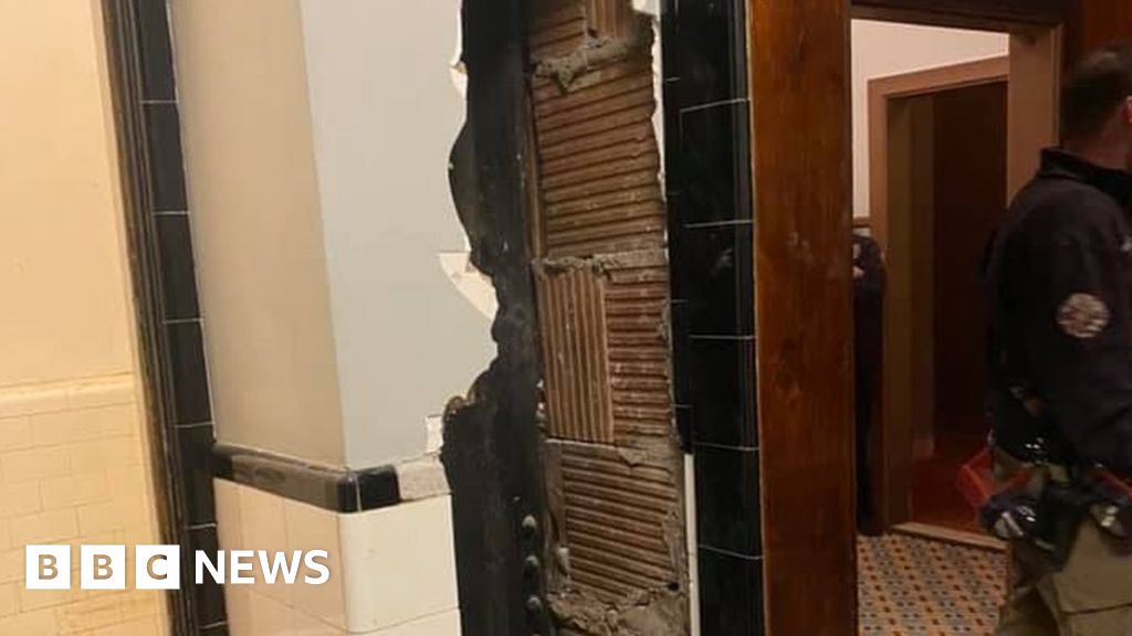 Man found naked inside wall of New York state theatre