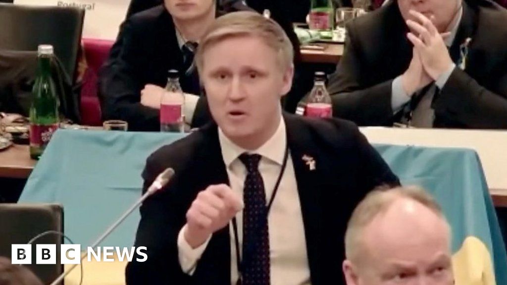 Latvian MP swears at Russia in Ukraine protest walkout