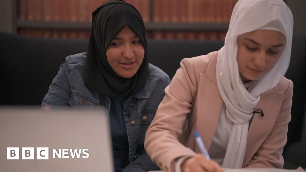 Afghan refugees made to move school take UK to court