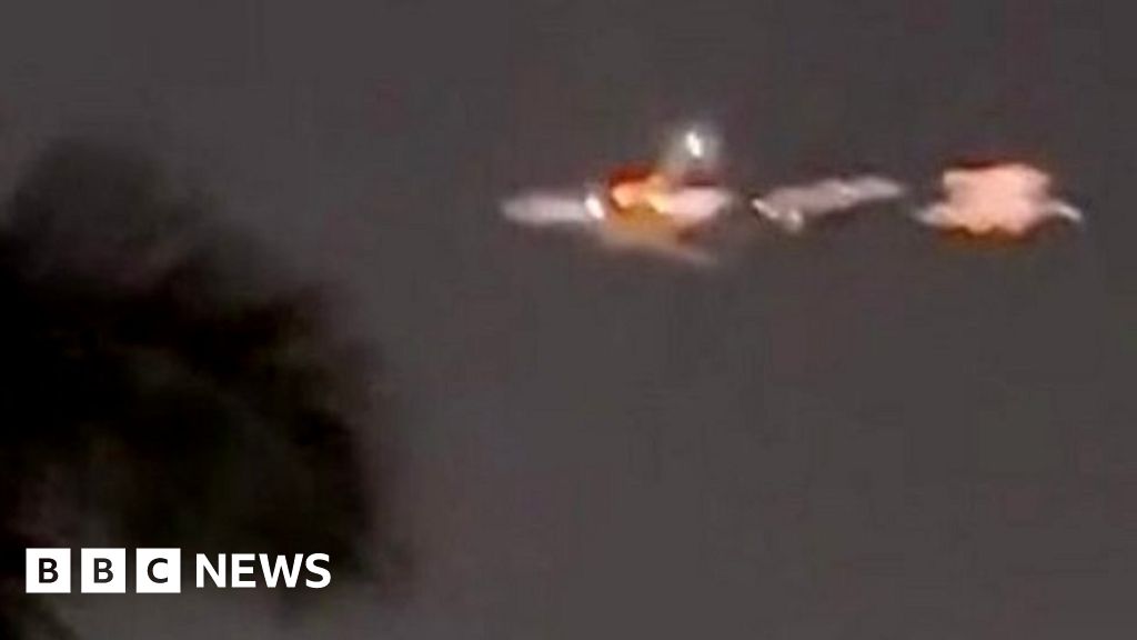 'It's on fire, mom!' Flames shoot from cargo plane mid-air