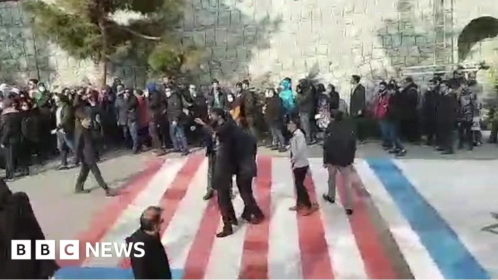 Image result for Iranian Students Refuse to Walk on The US and Israeli Flags Painted on the Street twitter