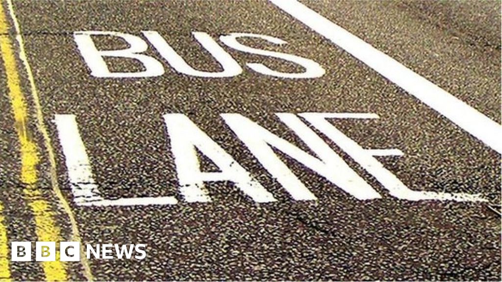 Parking: Cardiff driver's £100 fine after tyres touch yellow box - BBC News