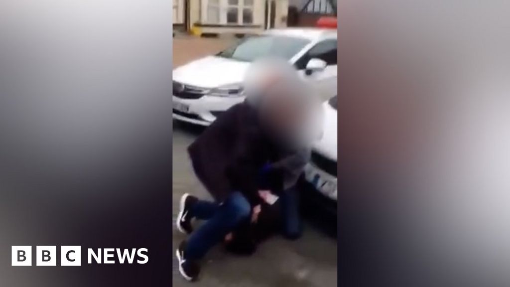Essex Police officer cleared of assault over 'kneeling on head' video