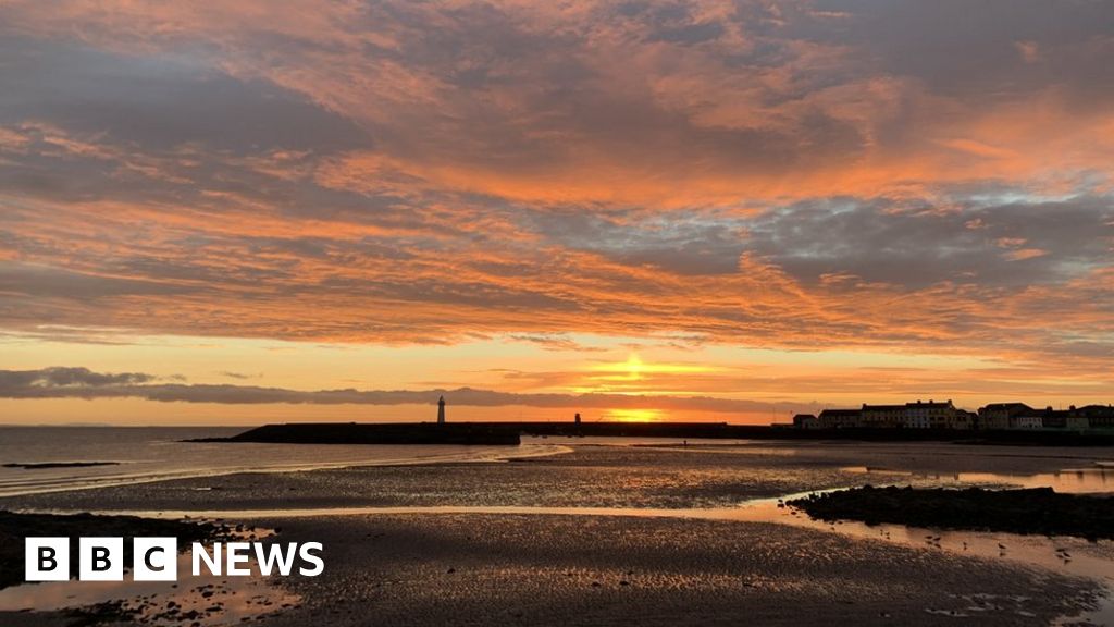 A red-sky sunset over Donaghadee Pier