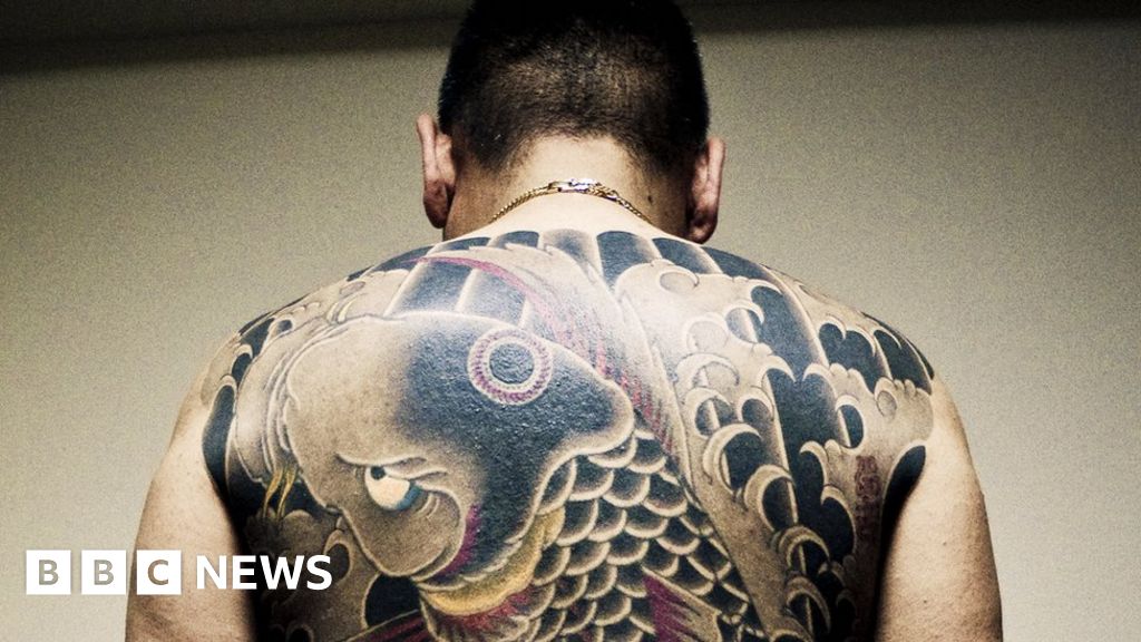 Tokyo Japan 20th May 2018 A woman showing her full body tattooed  possibly a member of the Japanese mafia or Yakuza attends the Sanja  Matsuri in Asakusa district on May 20 2018