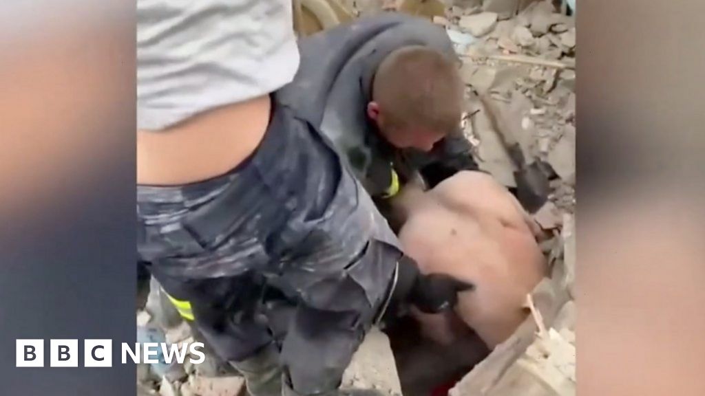 Moment man freed from rubble of destroyed Ukraine flats