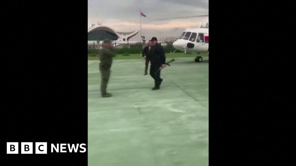 Belarus Lukashenko leaves helicopter carrying assault rifle BBC News