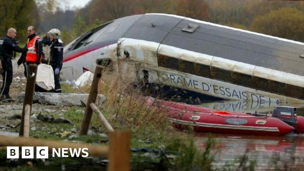 Rescue workers - including divers - search the wreckage of the TGV train near Strasbourg. Photo: 14 November 2015