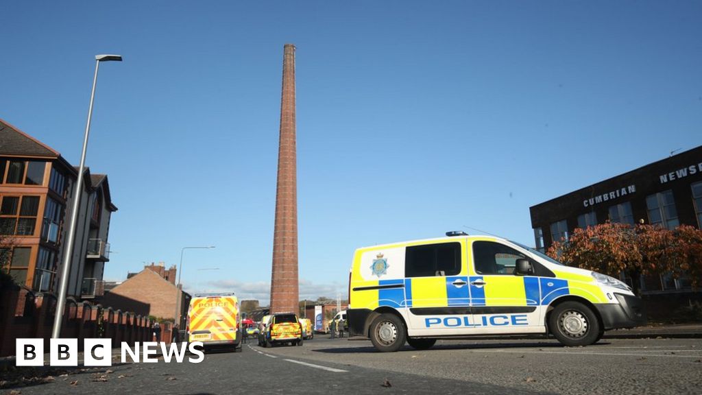 Carlisle chimney: Man stuck at top of 290ft structure