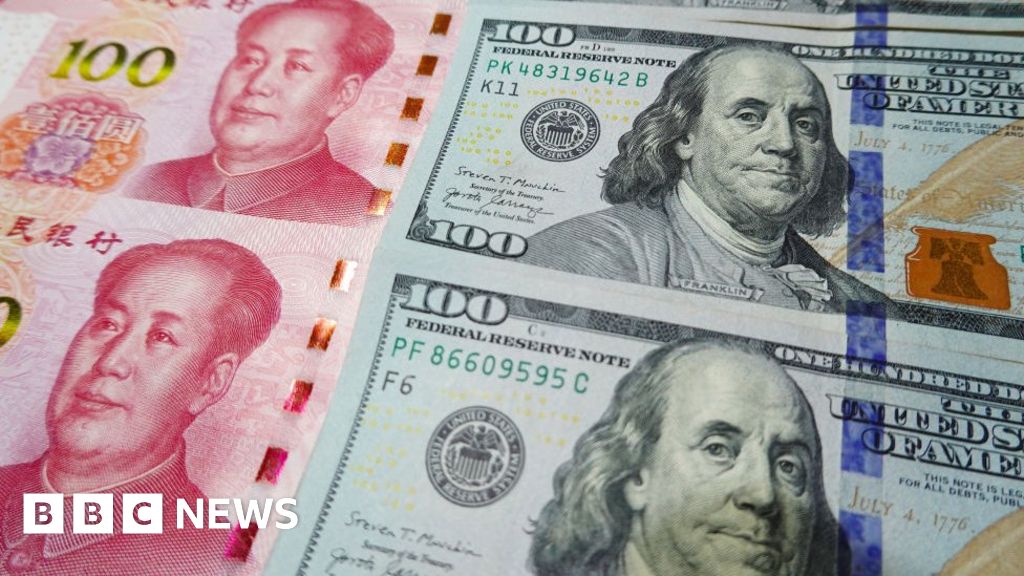 Chinese yuan: Currency hits record lows against US dollar