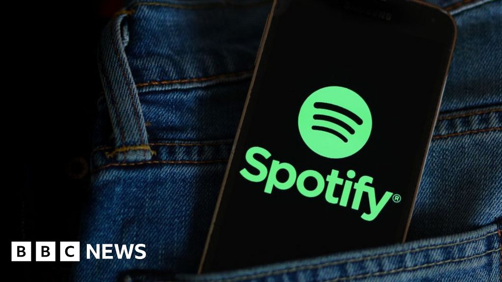 Spotify to axe 17% of staff to save costs