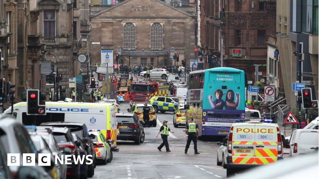 Man shot dead by police after Glasgow stabbings
