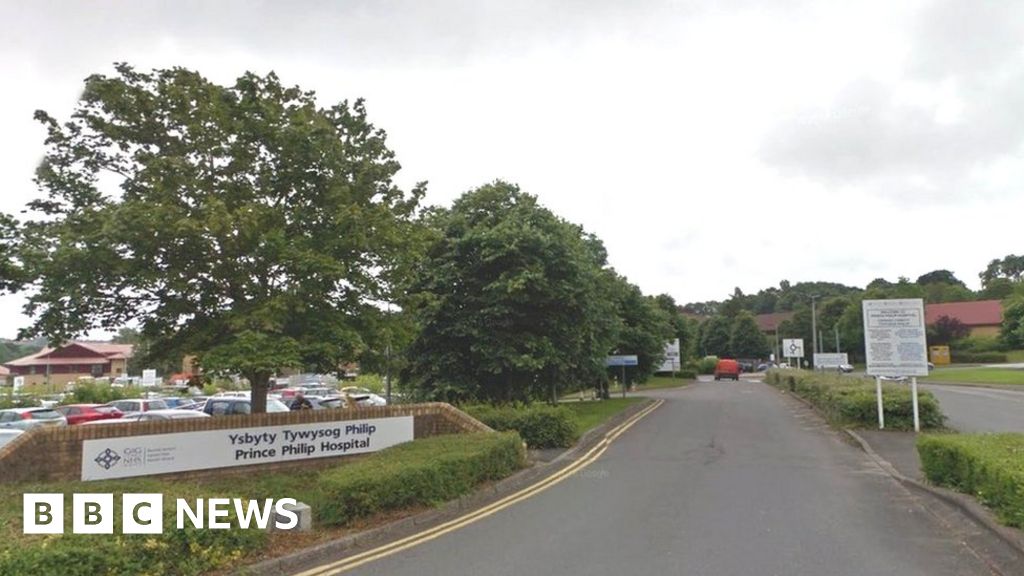 Norovirus-hit Prince Philip Hospital in Llanelli reopens - BBC News