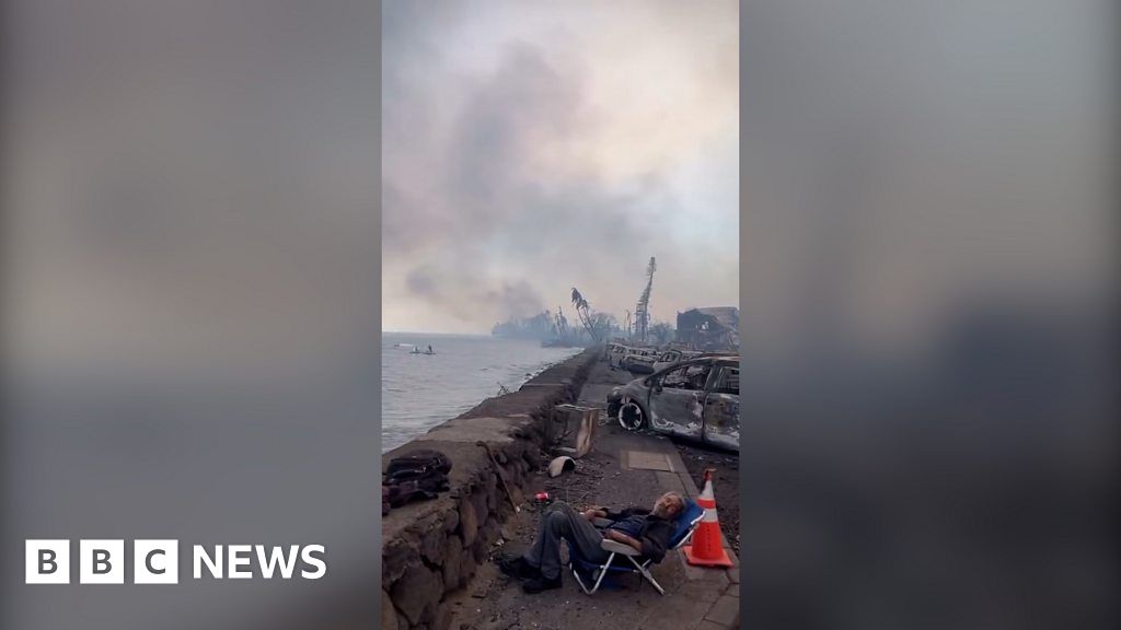Resident films charred remains of downtown Lahaina