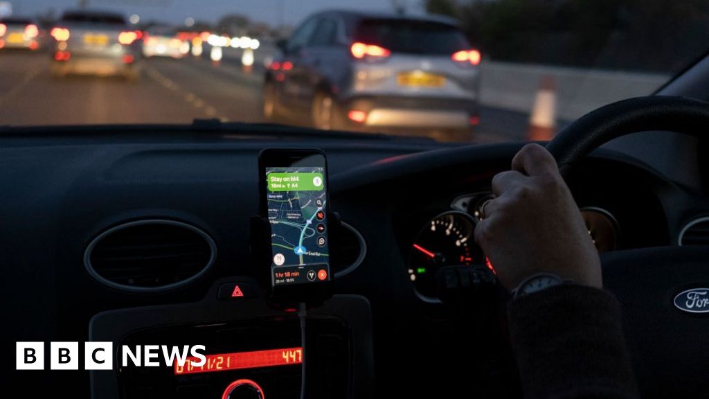 Drivers to be banned from using hand-held devices