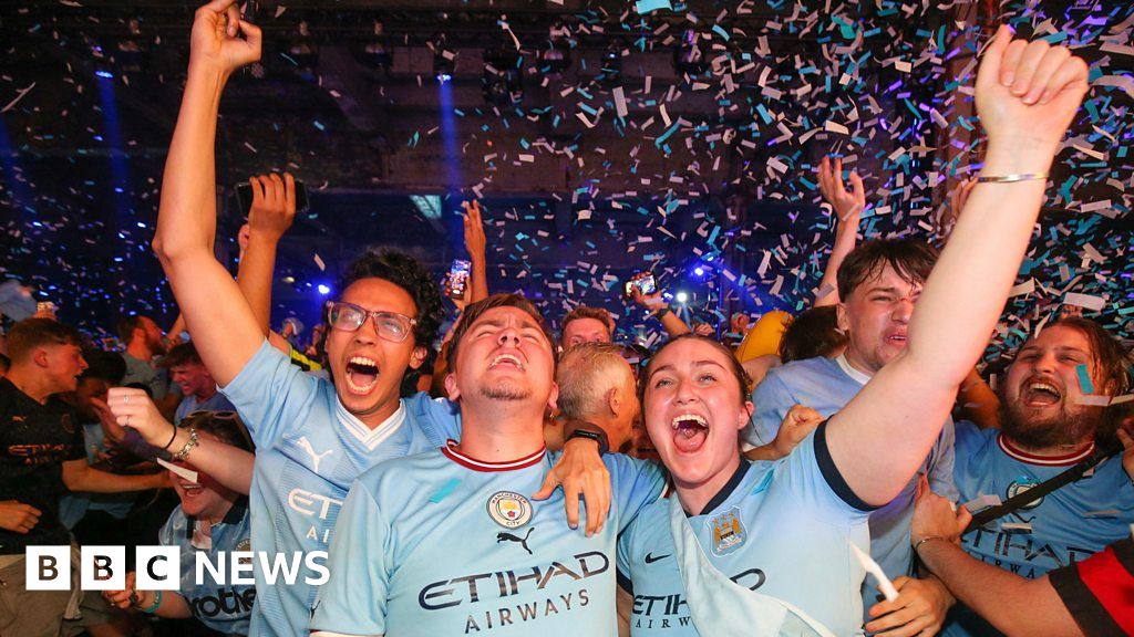 Euphoric Man City fans celebrate Champions League win