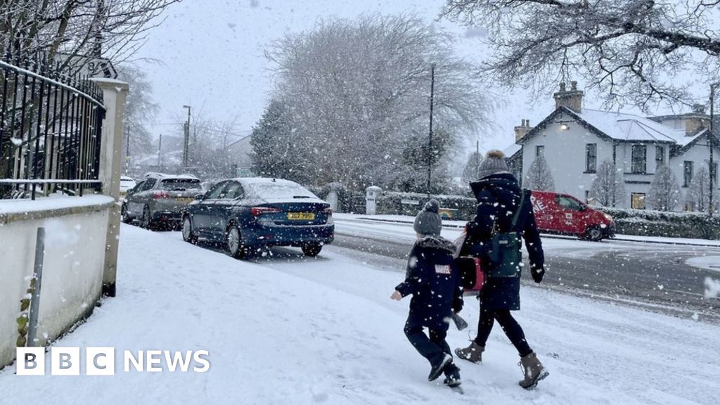 UK weather: Snow and ice causes travel chaos and shuts schools