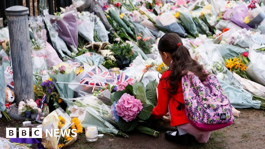 Queen Elizabeth II: Gun salutes and floral tributes as UK mourns