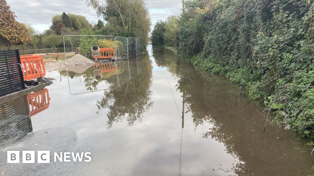 Wales flooding: Wrexham village's defences not properly used