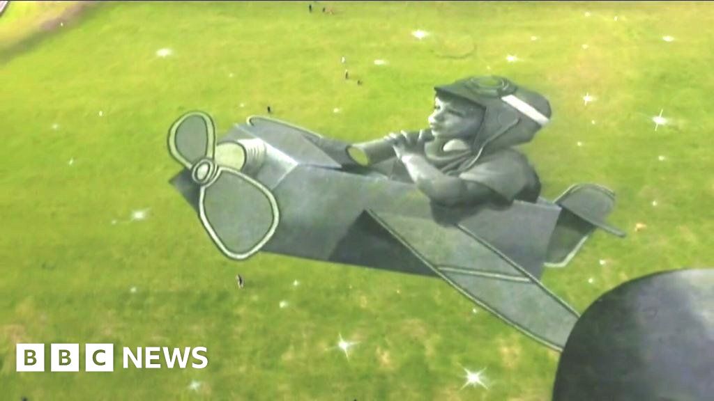 New Brighton Chalk and charcoal artwork unveiled near beach BBC News