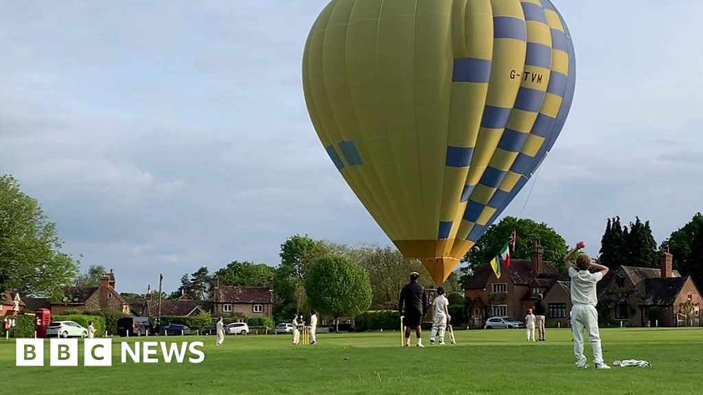 Hot air balloon interrupts Sussex kids cricket match 