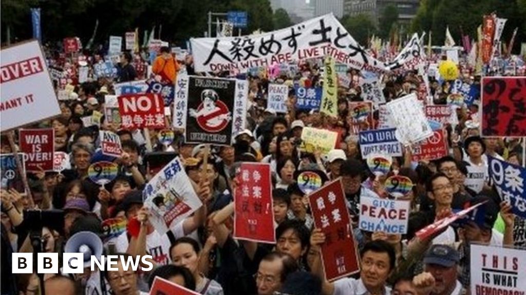 Japan Military Law Changes Draw Protests - BBC News