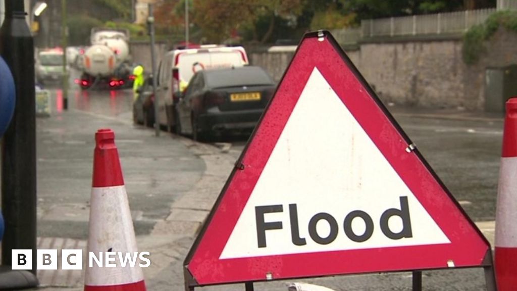 North West flooding: Firefighters rescue people stranded in vehicles 