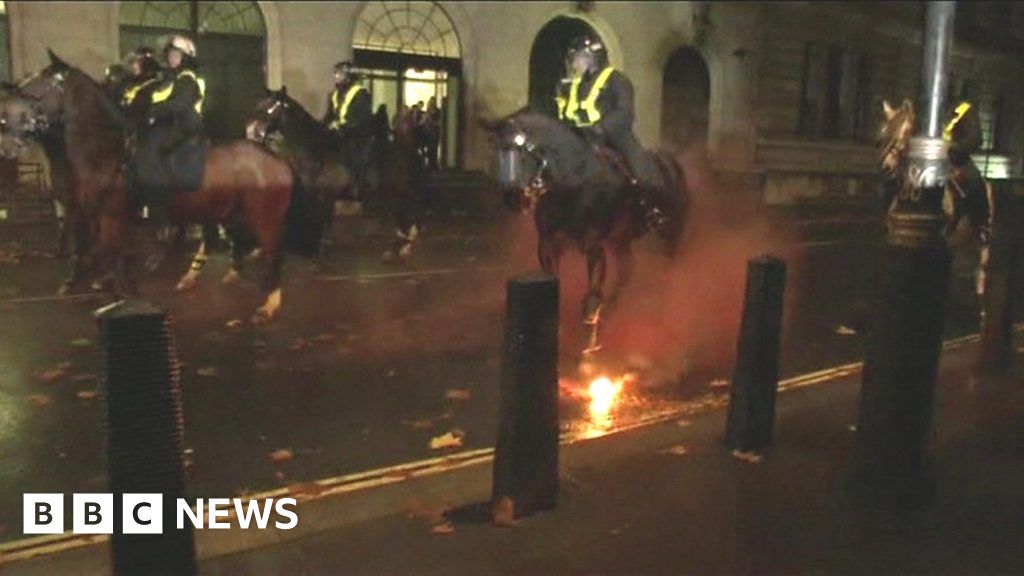 Fireworks thrown at London riot police horses BBC News