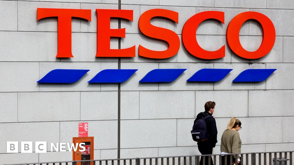 Tesco reports easing price pressures as profits surge