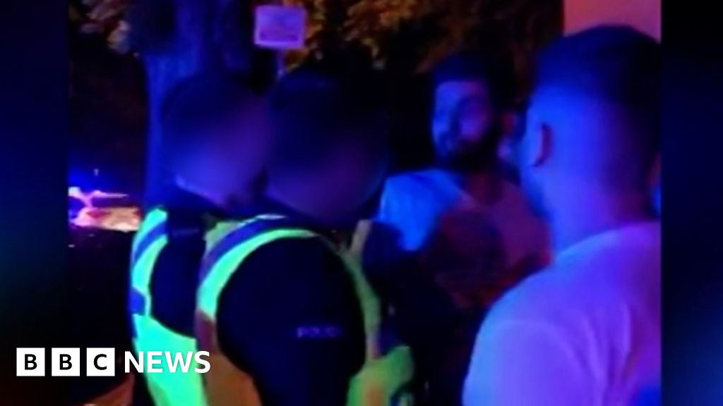 Footage shows West Midlands Police officer dispersing crowd with baton ...