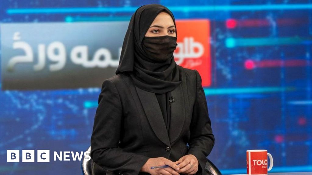 Afghanistan’s female TV presenters cover their faces