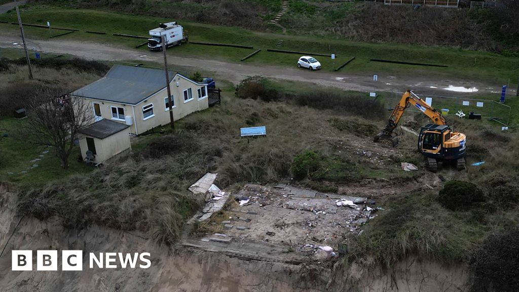 Cliff-top home demolished before it falls on beach