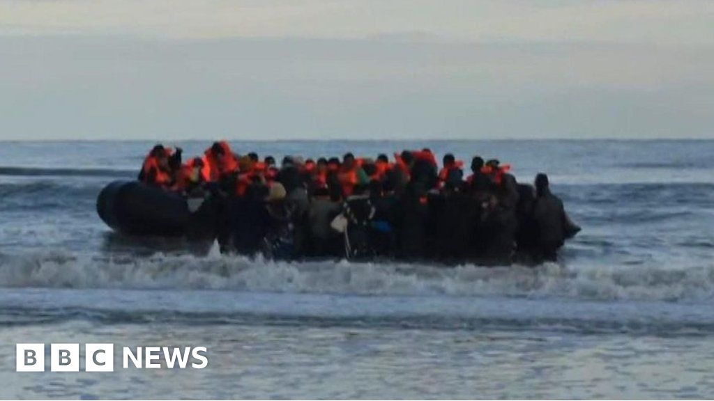 Migrants cram into small boat as BBC films in Calais