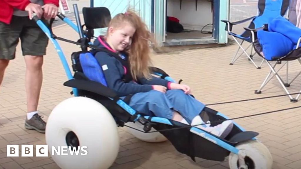 Barry Island's wheelchairs are transforming beach trips - BBC News