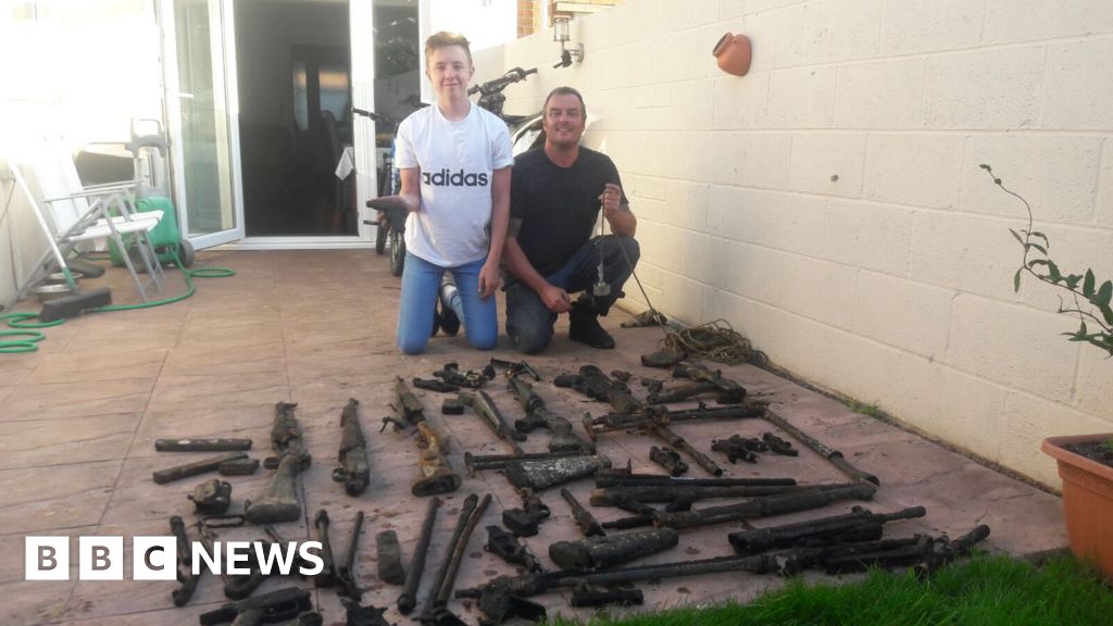 Father and son find WW2 guns in river at Grey Lake