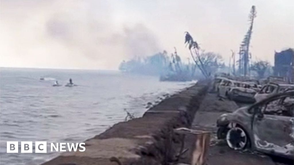 Resident films charred remains of downtown Lahaina - BBC News