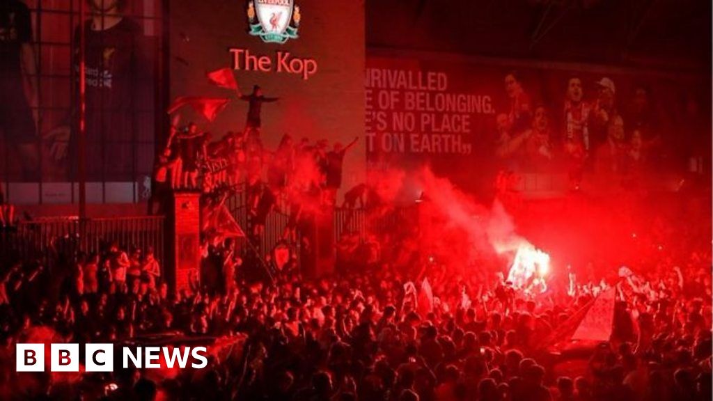 Liverpool Fans Celebrate Outside Anfield Stadium With Flares And Fireworks