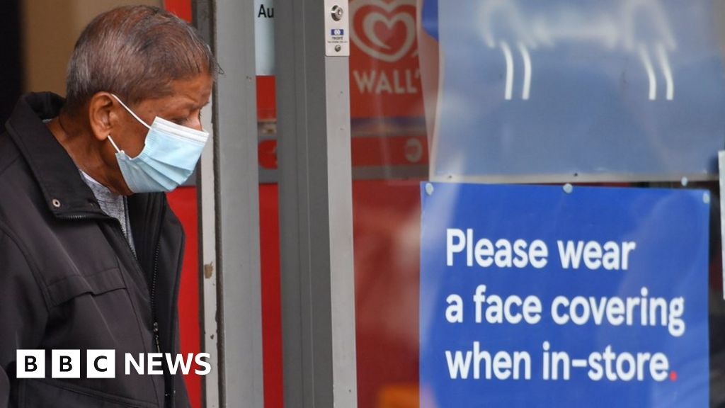 Tesco encourages shoppers and staff to keep wearing masks